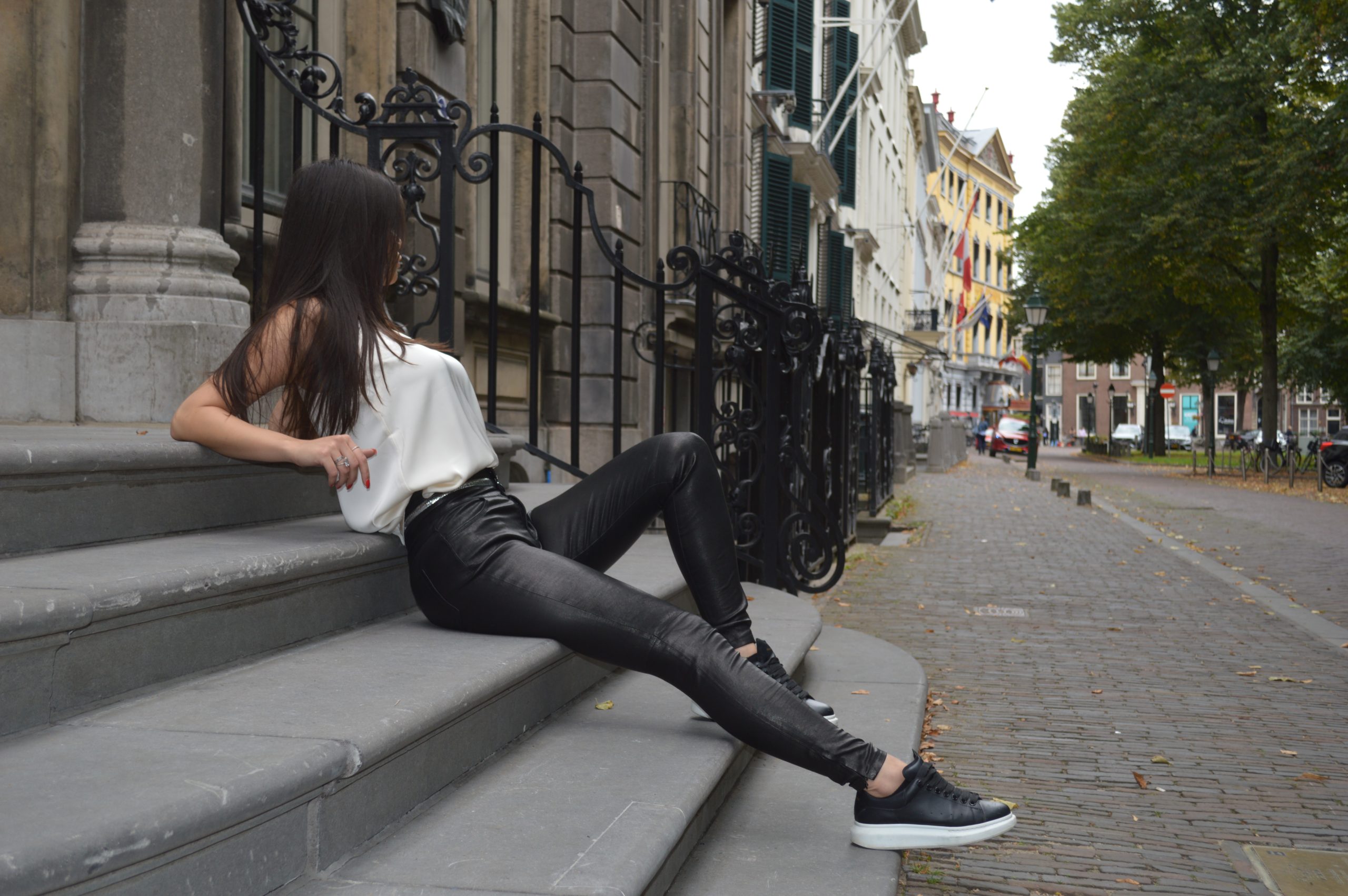 Women with leather pants on street